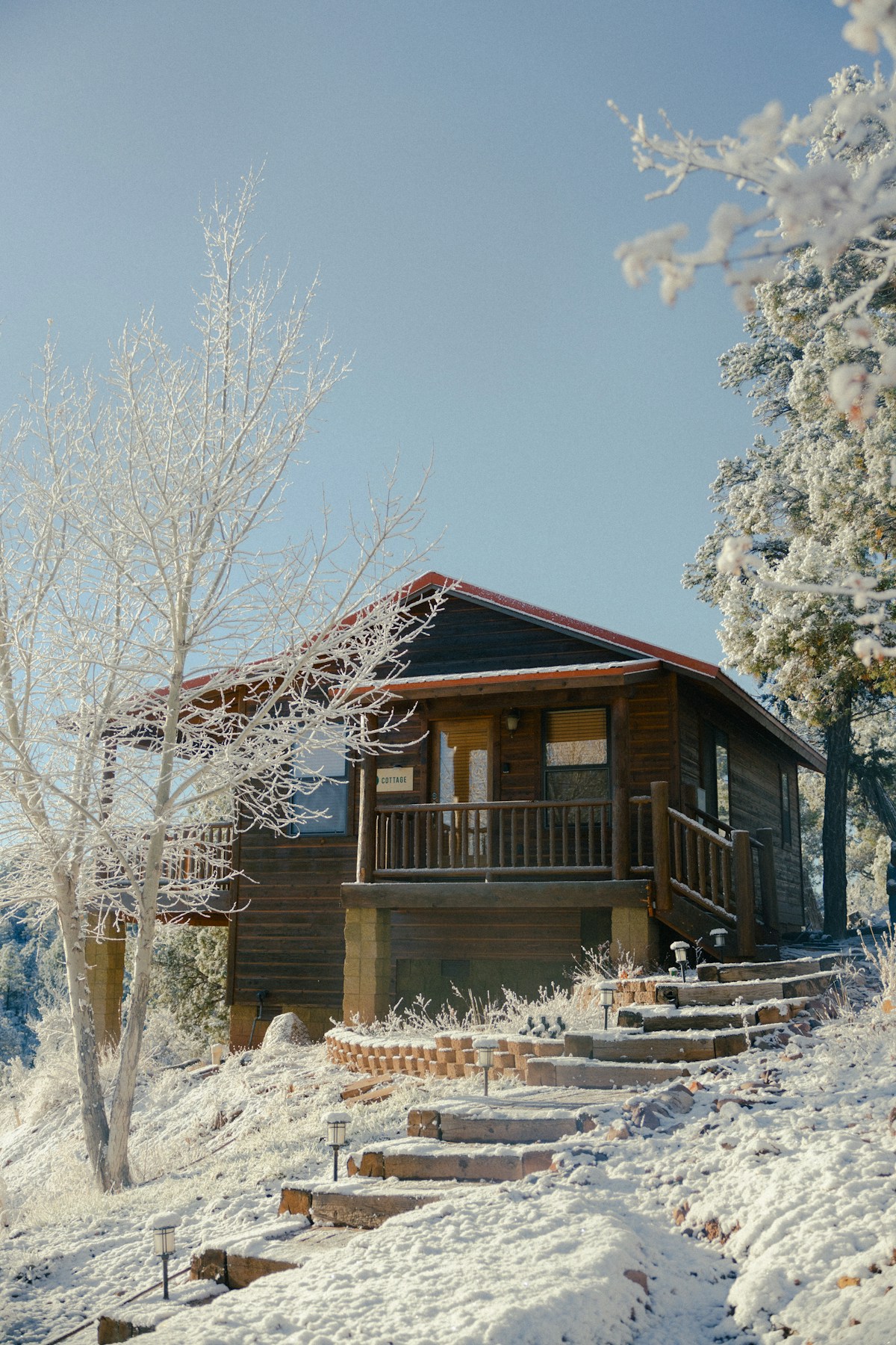 Cabin entrance with snow-covered steps